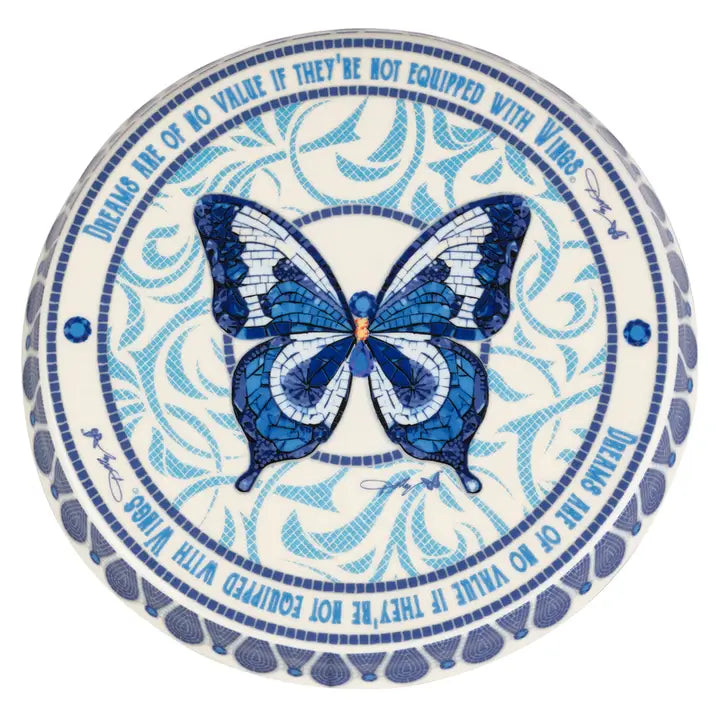 Top view of a Blue and White Cake Stand with a Butterfly Design on a white background