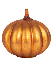 Gold pumpkin decoration on a white background