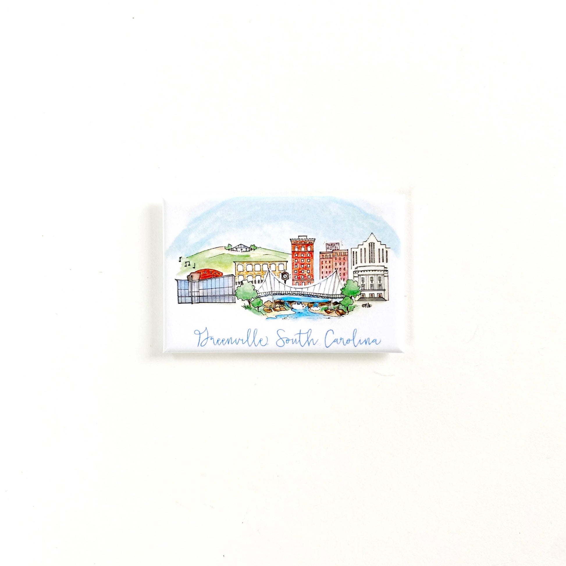 A small rectangular printed card or magnet featuring a watercolor illustration of the Brewhouse in Greensboro, South Carolina, with the text Greenville South Carolina' below, shown on a plain white background.
