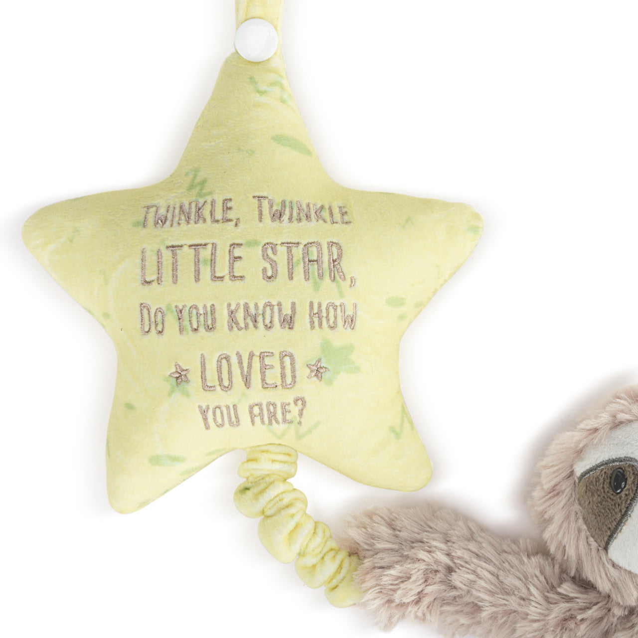 Star-shaped plush toy with text and a sloth toy on a white background