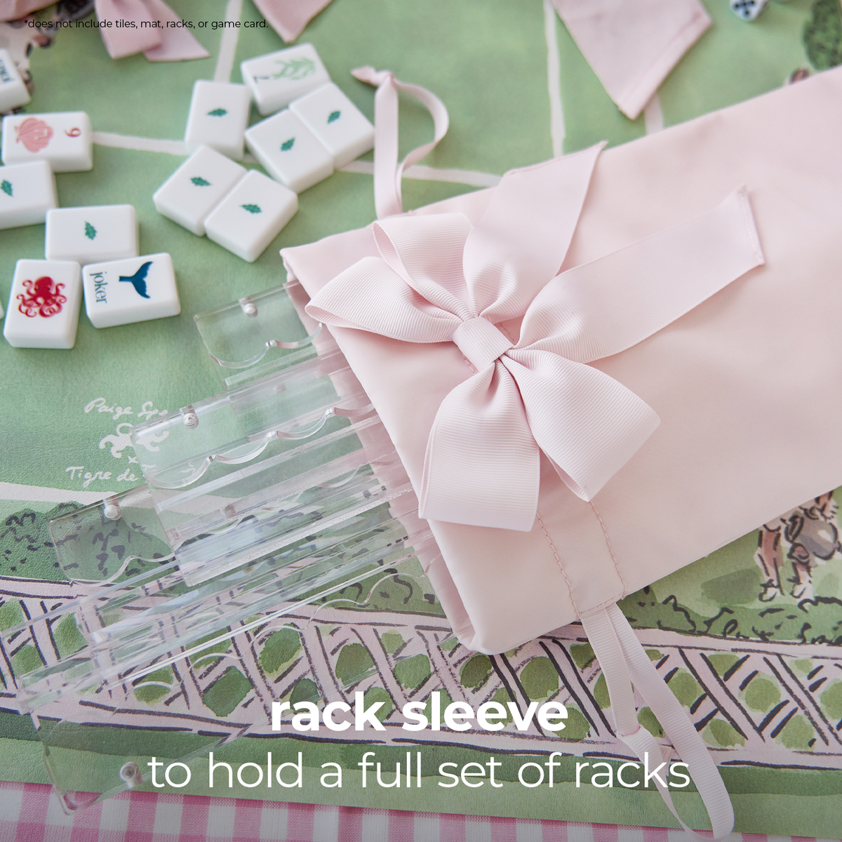 A pale pink fabric rack sleeve with a large satin bow, shown on a patterned green surface with clear plastic rack inserts and small decorative tiles. Text at the bottom reads 'rack sleeve to hold a full set of racks'.
