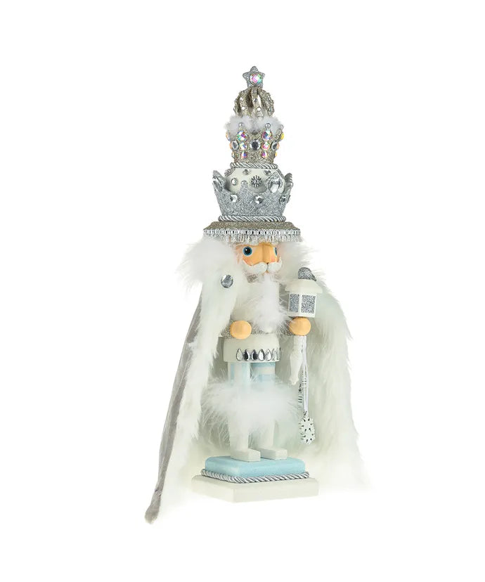 Decorative figure with a crown and long white beard on a white background
