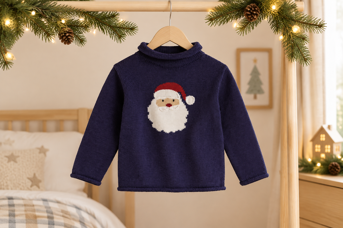 Mud Pie navy Santa rollneck sweater hanging in a festive children’s bedroom, size Large (4T-5T)