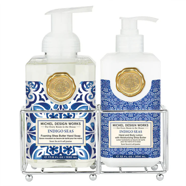 indigo seas hand care caddy with soap and lotion in silver holder with a white background