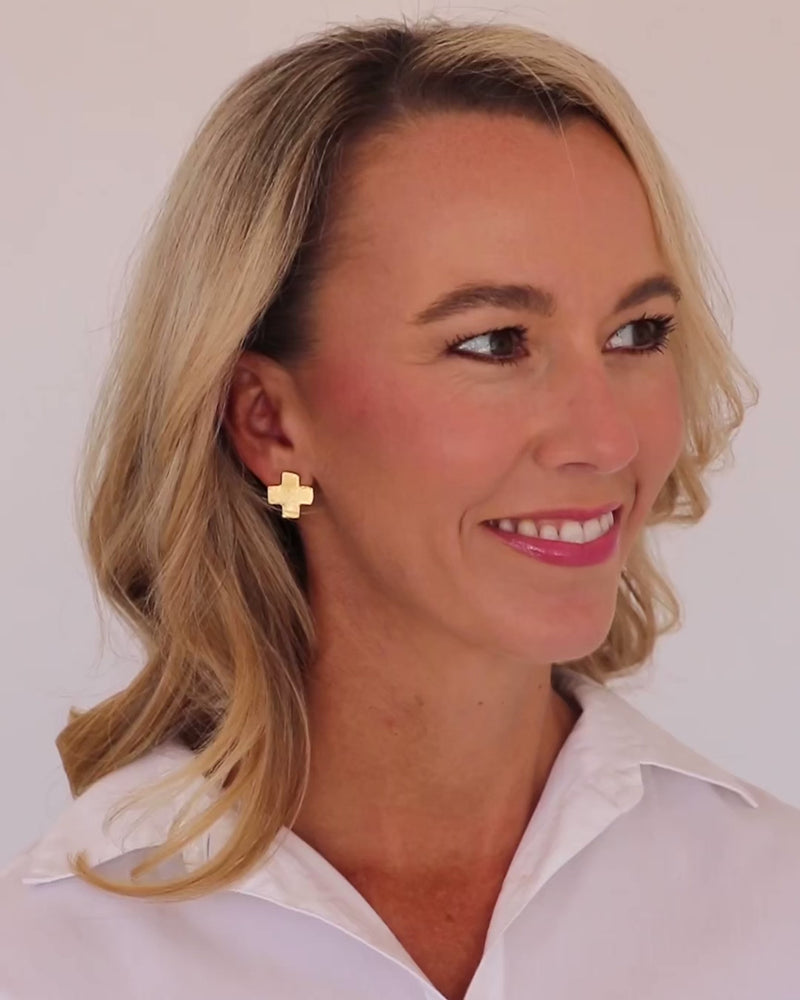 Video of woman wearing Susab Shaw mini Gold Cross Earrings